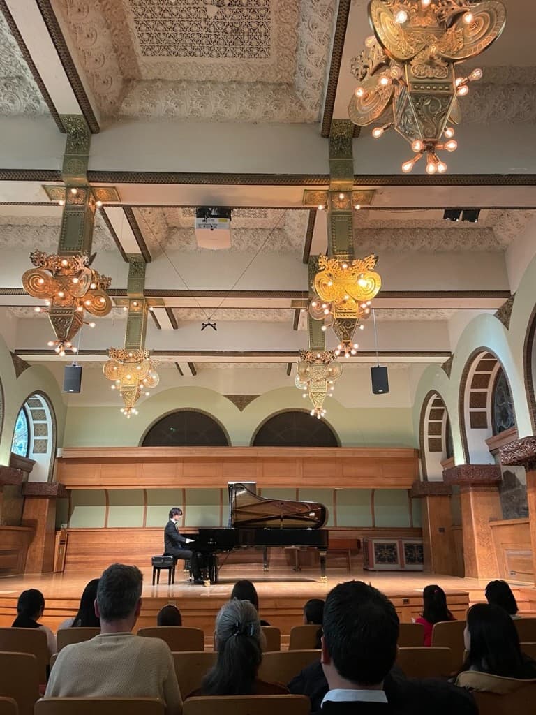 Piano performance in a concert hall