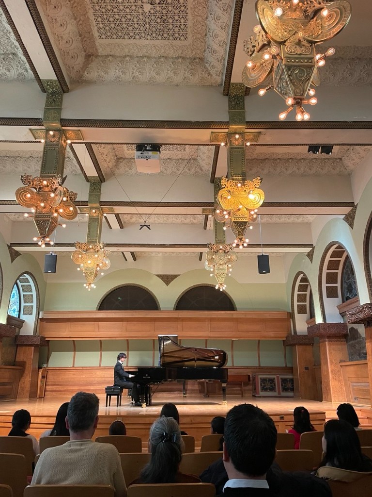 Piano performance in a concert hall