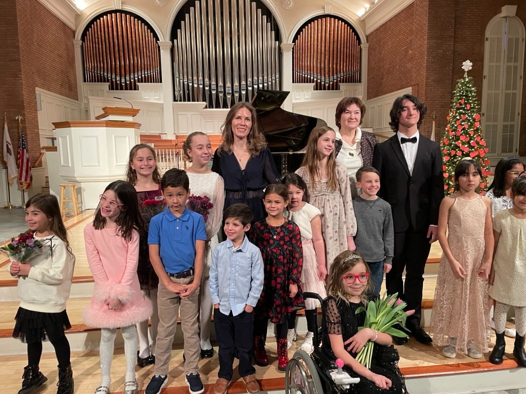 Family Music Academy students and teachers after a recital
